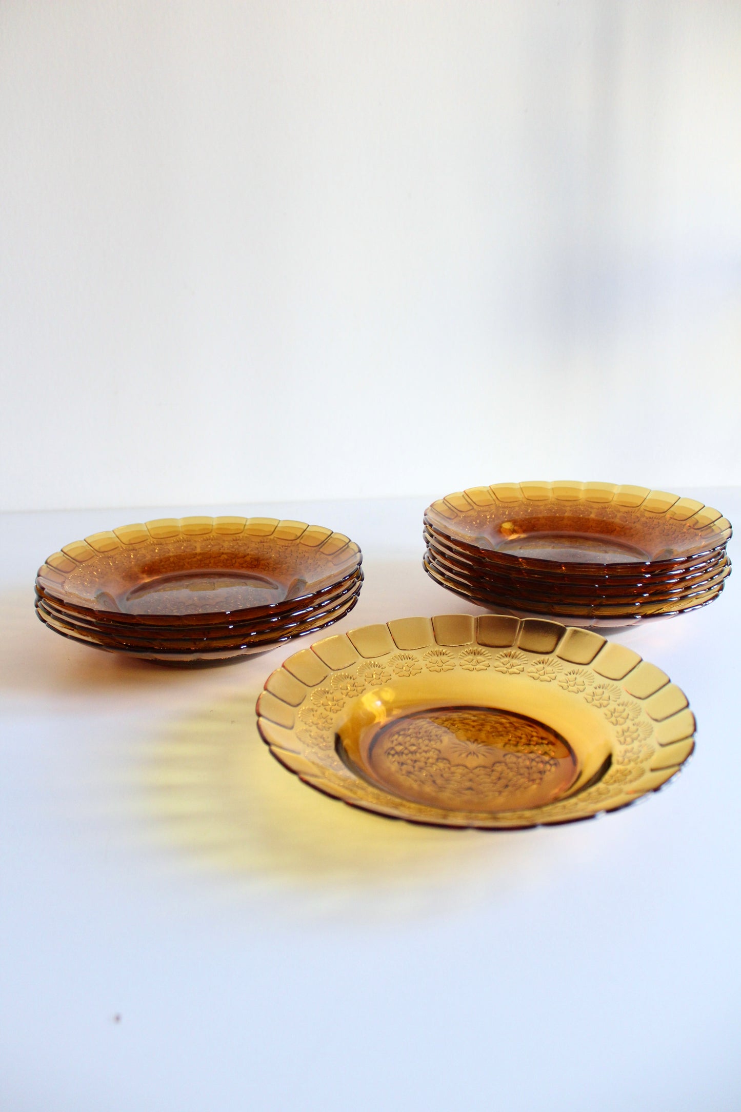 Set of 11 Vintage Amber Pressed-Glass Plates