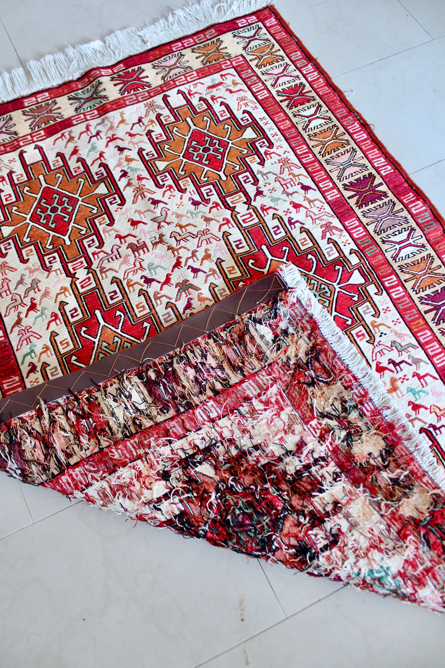Vintage Handwoven Soumak-Style Rug with Animal Motifs