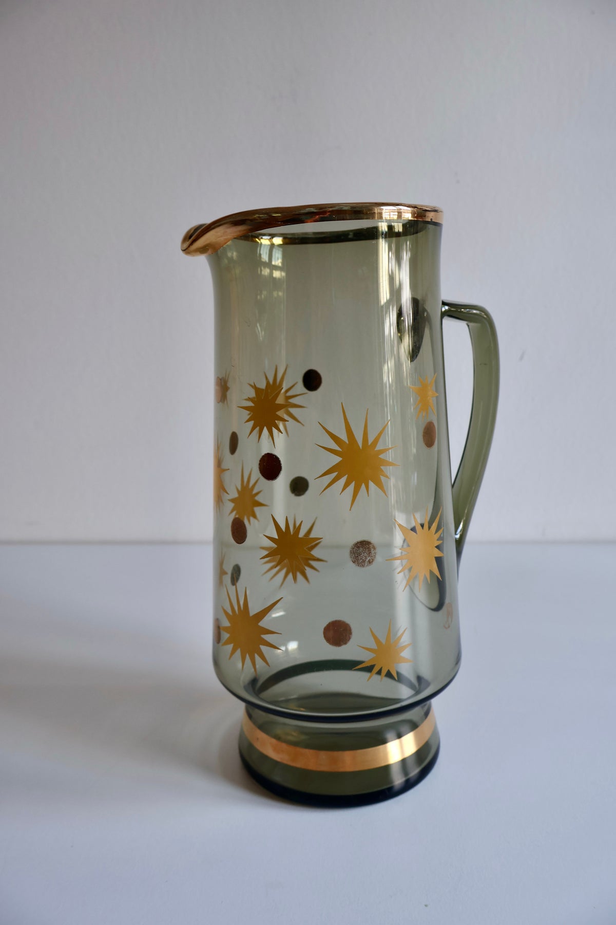 Vintage Smoked Glass Pitcher with Gold Starburst Design – 24 cm